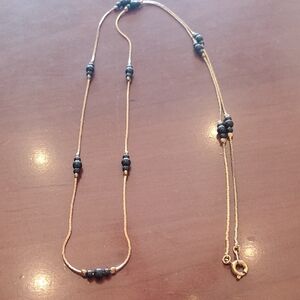 Elegant Gold and Black Beaded Necklace